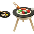 Kiddo Joy BBQ Playset by PlanToys, an eco-friendly toy designed to encourage role play, social skills, and creativity with realistic BBQ accessories for imaginative cooking fun.