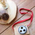 Kiddo Joy Colored Snap Camera by PlanToys, an eco-friendly toy designed to encourage imaginative play, enhance early photography skills, and foster creativity with vibrant, easy-to-use snap camera features.