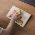 Kiddo Joy Giraffe Puzzle by PlanToys, an eco-friendly toy designed to enhance cognitive skills, problem-solving, and hand-eye coordination with fun, colorful giraffe-shaped pieces.
