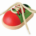 Kiddo Joy Tie-Up Shoe by PlanToys, an eco-friendly toy designed to enhance fine motor skills, hand-eye coordination, and independence through fun lacing and tying activities.