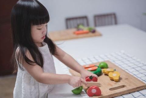 Wonky Fruit & Vegetables by PlanToys at Kiddo Joy – An eco-friendly wooden toy set for pretend play, promoting creativity, fine motor skills, and cognitive development while teaching kids about healthy eating.